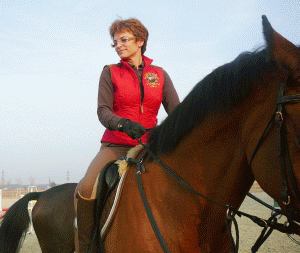 Doamna dr. Ozana Moraru, fondator şi coordonator al Clubului Equestria din satul Tâncăbeşti-Ilfov-Baza Hipică "Ştefan Stoica"