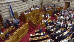 Eurogrup a aprobat începerea negocierilor privind un plan de ajutor pentru Grecia