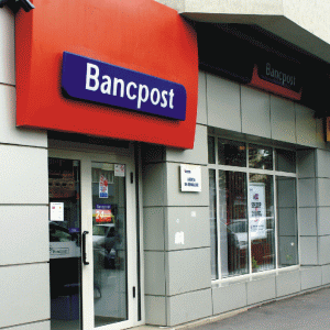 Debitorii, nemulţumiţi de modul în care Bancpost îndeplineşte dispoziţiile ANPC