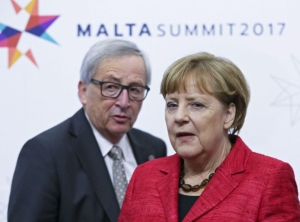 Angela Merkel şi Jean-Claude Juncker (Sursa foto: Twitter)