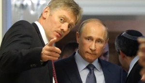 Dmitry Peskov şi Vladimir Putin