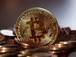 China vrea să interzică minarea de bitcoin