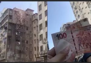 Blocaj în trafic după ce un bărbat a început să arunce cu bani de la fereastră
