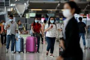 China restricţionează deplasările în străinătate pentru cetăţenii săi