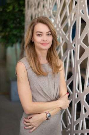 Anca Merdescu, Associate Director Investment Services