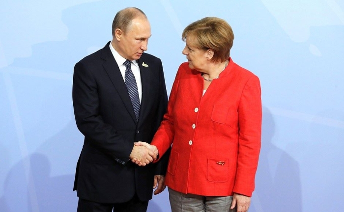 Vladimir Putin şi Angela Merkel (Sursa foto: Facebook)