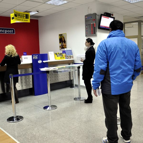 Împrumutaţii Bancpost în CHF - nemulţumiţi de oferta de conversie a Băncii Transilvania