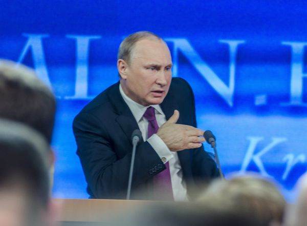 Putin acuză Occidentul că vrea "să termine" Rusia