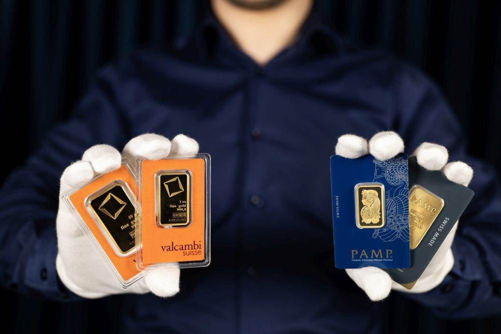 Preţul aurului a depăşit pragul de 3.000 de dolari/uncie, pentru prima dată în istorie