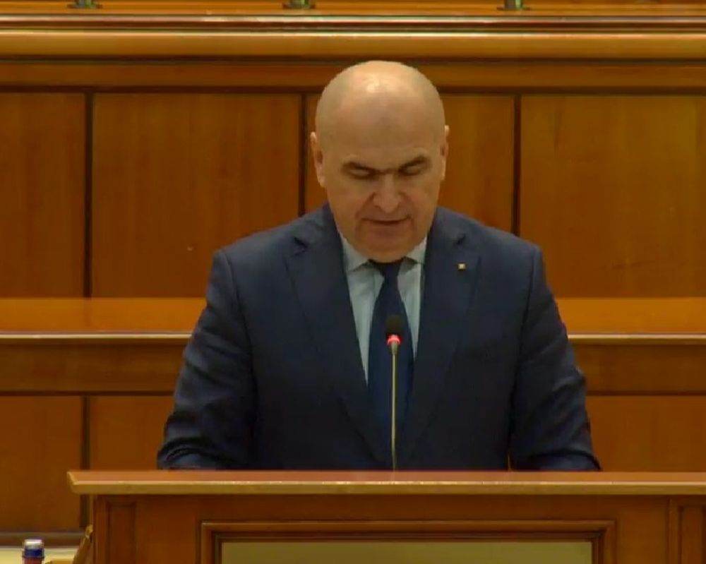 Parlamentul a început dezbaterea celei de-a treia moţiuni de cenzură împotriva Guvernului Bolojan